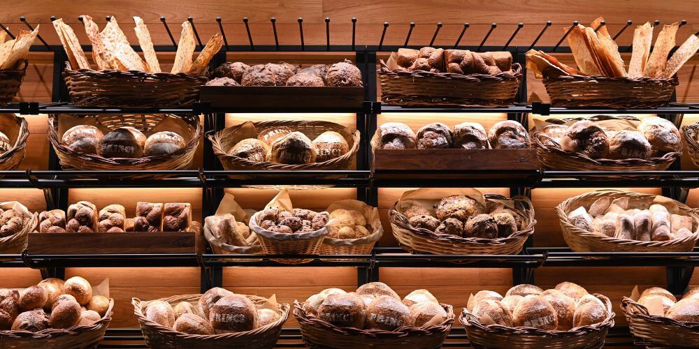 Expositor metálico de produtos de padaria iluminado